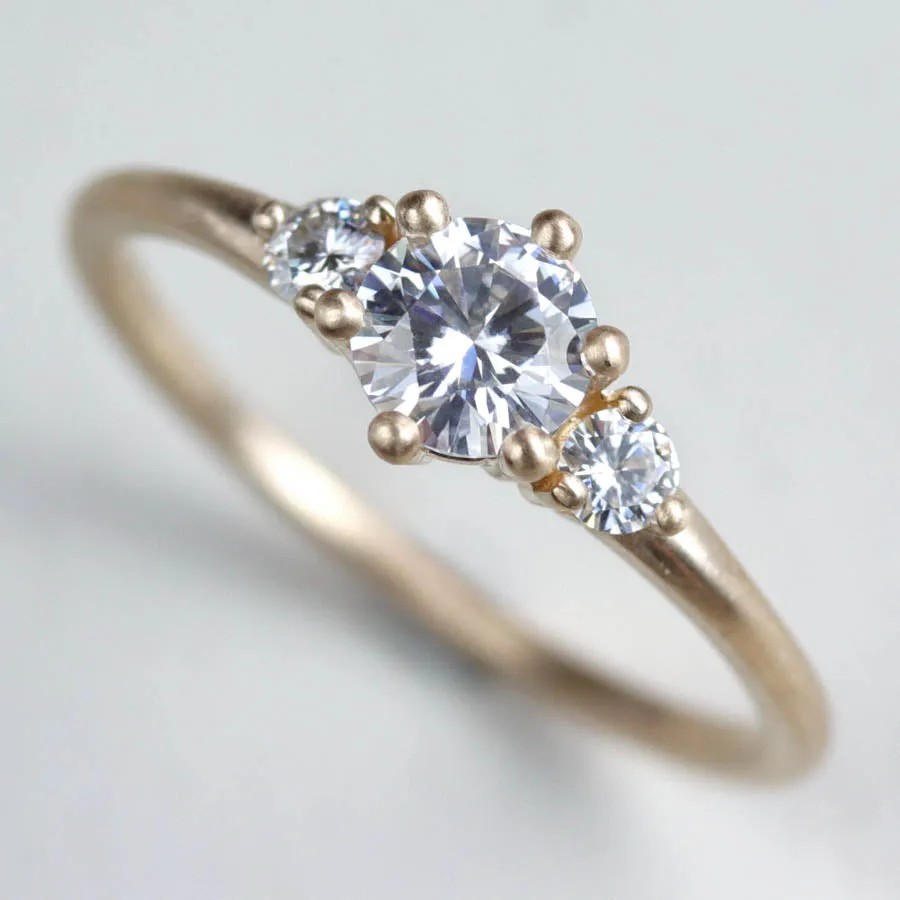 5mm Prong-set Three Stone Ring •